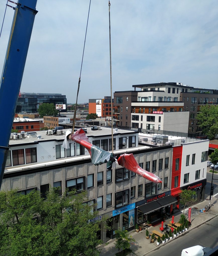 Crane truck move in Montreal